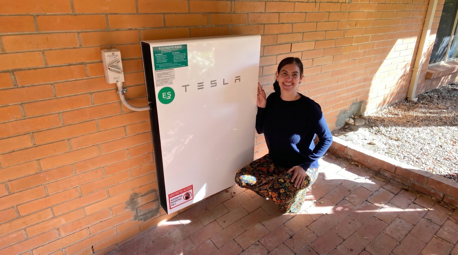 NSW home with rooftop solar and a wall-mounted battery